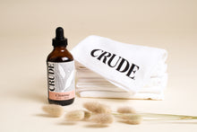 Load image into Gallery viewer, A bottle of CRUDE&#39;s 4oz Cleanse next to a 6 pack of white microfiber Pull Cloths
